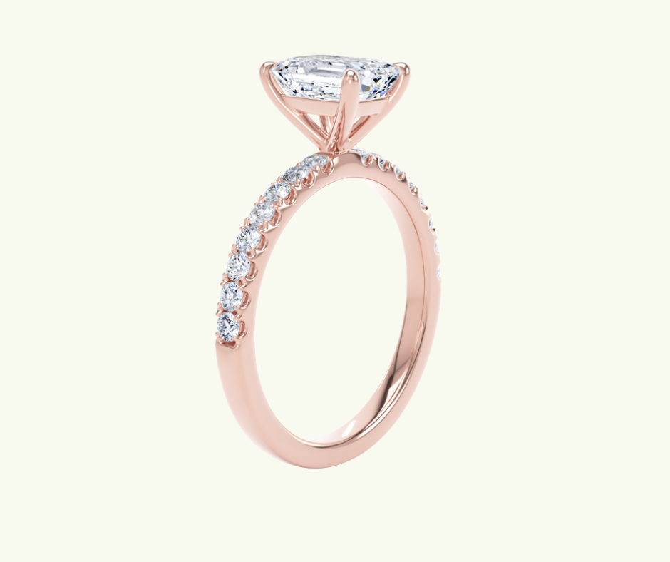 Emerald cut modern diamond shoulder set ring