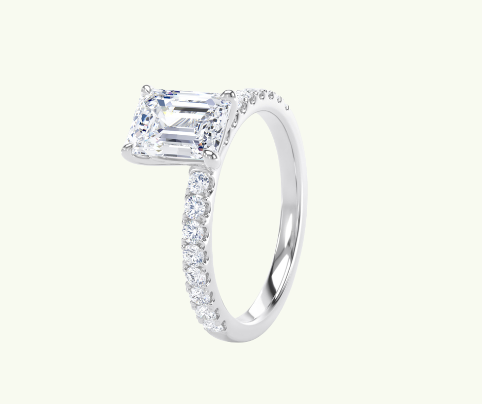 Emerald cut modern diamond shoulder set ring